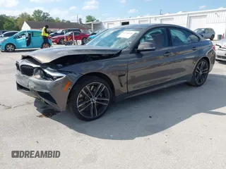 2018 BMW 4 Series 440i with VIN WBA4J5C54JBF07315, listed as a IAAI auction lot 41738540 with 74,577 mi miles and . Bid and sale history available at DreamBid. Image 2.