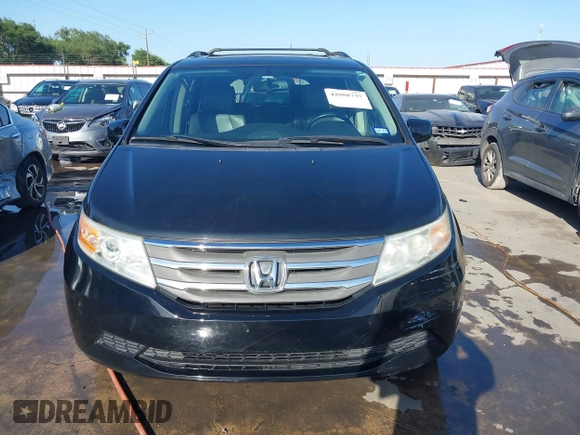2013 Honda Odyssey EX-L with VIN 5FNRL5H6XDB090768, listed as a IAAI auction lot 42008759 with 116,052 mi miles and . Bid and sale history available at carsss.com. Image 12.