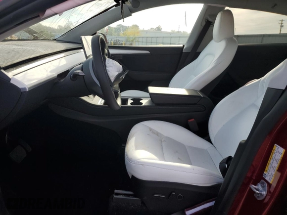 2024 Tesla Model Y with VIN 7SAYGDED2RA331985, listed as a Copart auction lot 50849025 with 6,108 mi miles and Salvage title. Bid and sale history available at DreamBid. Image 7.