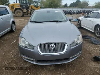 2009 Jaguar XF with VIN SAJWA07C991R41110, listed as a Copart auction lot 73204964 with 147,727 mi miles and Salvage Title. Bid and sale history available at DreamBid. Image 5.