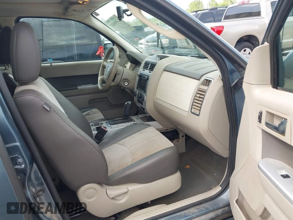 2011 Mercury Mariner Premier with VIN 4M2CN9HG7BKJ02899, listed as a IAAI auction lot 42490843 with 268,830 mi miles and . Bid and sale history available at DreamBid. Image 5.