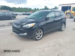 2015 Ford Escape Titanium with VIN 1FMCU9J92FUA96987, listed as a IAAI auction lot 42678423 with 188,956 mi miles and . Bid and sale history available at DreamBid. Image 17.