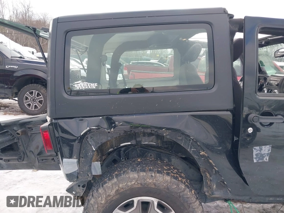 2013 Jeep Wrangler Rubicon 10th Anniversary with VIN 1C4BJWCG3DL591186, listed as a IAAI auction lot 41315969 with 54,984 mi miles and . Bid and sale history available at DreamBid. Image 6.