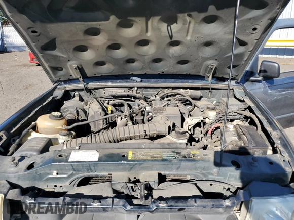 2005 Mazda B-Series 2WD Truck with VIN 4F4YR12D85PM00358, listed as a Copart auction lot 74214954 with 221,015 mi miles and Salvage Title. Bid and sale history available at carsss.com. Image 12.