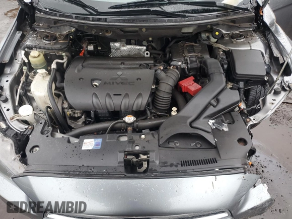 2014 Mitsubishi Lancer SE z VIN JA32V2FW8EU020237, wystawiony jako Copart lot #50333595 z przebiegiem 128 289 mil mil oraz Szkoda całkowita • Salvage title. Historia ofert i sprzedaży dostępna na DreamBid. Obrazek 12.