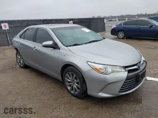 2016 Toyota Camry Hybrid LE with VIN 4T1BD1FK2GU197571, listed as a IAAI auction lot 41555317 with 101,464 mi miles. Bid and sale history available at carsss.com. Image 1.
