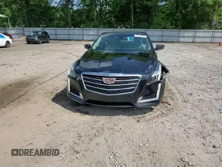 2016 Cadillac CTS Luxury Collection RWD z VIN 1G6AR5SX5G0106572, wystawiony jako Copart lot #57314745 z przebiegiem 129 830 mil mil oraz Szkoda całkowita • Salvage title. Historia ofert i sprzedaży dostępna na DreamBid. Obrazek 13.