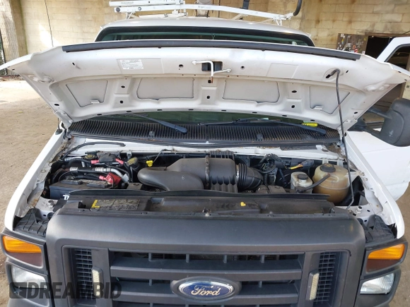 2012 Ford Econoline Cargo Commercial with VIN 1FTNE1EW3CDA31914, listed as a IAAI auction lot 41622154 with 99,254 mi miles and . Bid and sale history available at carsss.com. Image 10.