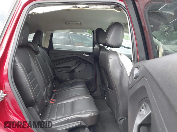 2016 Ford Escape Titanium with VIN 1FMCU9JX0GUA29353, listed as a IAAI auction lot 42133326 with 143,892 mi miles and . Bid and sale history available at DreamBid. Image 8.