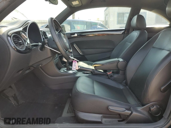 2012 Volkswagen Beetle 2.5L w/Sound/Nav PZEV with VIN 3VWJP7AT7CM646779, listed as a Copart auction lot 53756265 with 116,662 mi miles and Salvage Title. Bid and sale history available at DreamBid. Image 7.