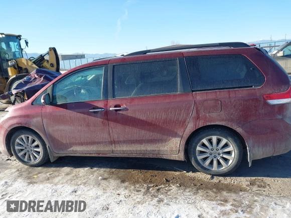 2014 Toyota Sienna XLE with VIN 5TDYK3DC5ES425818, listed as a IAAI auction lot 41421282 with 105,586 mi miles and . Bid and sale history available at DreamBid. Image 14.
