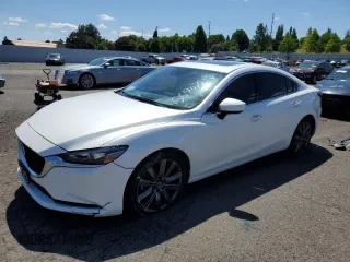 2021 Mazda 6 Grand Touring with VIN JM1GL1TY7M1600088, listed as a Copart auction lot 56907534 with 53,330 mi miles and Salvage Title. Bid and sale history available at carsss.com. Image 1.