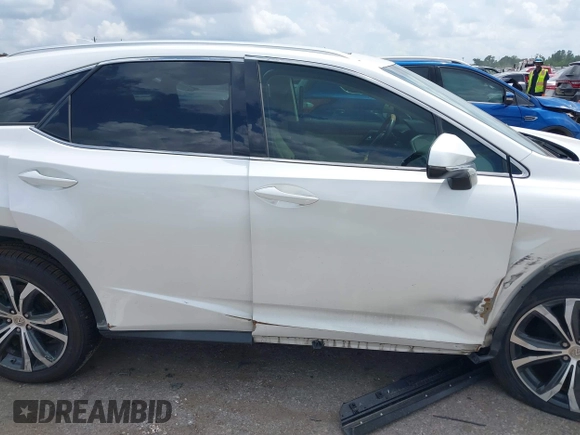 2016 Lexus RX 350 z VIN 2T2ZZMCAXGC001550, wystawiony jako IAAI lot #42083488 z przebiegiem 93 377 mil mil oraz . Historia ofert i sprzedaży dostępna na DreamBid. Obrazek 13.