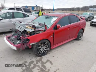 2016 Mitsubishi Lancer GT with VIN JA32U8FW1GU012988, listed as a IAAI auction lot 41498905 with 94,727 mi miles. Bid and sale history available at carsss.com. Image 16.