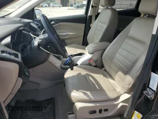 2013 Ford Escape SEL z VIN 1FMCU9HXXDUD65870, wystawiony jako Copart lot #60985855 z przebiegiem 139 440 mil mil oraz Szkoda całkowita • Salvage title. Historia ofert i sprzedaży dostępna na DreamBid. Obrazek 7.