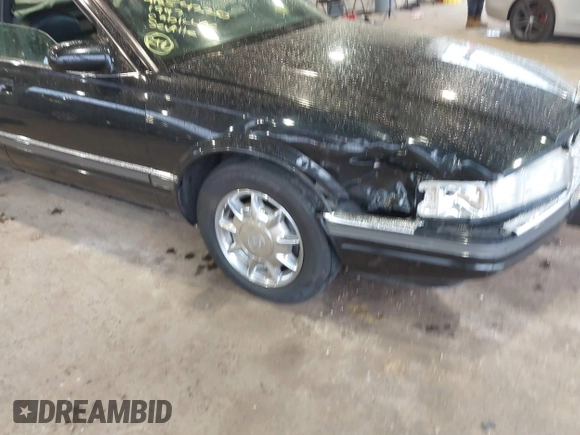 1997 Cadillac Seville Luxury SLS with VIN 1G6KS52YXVU816736, listed as a IAAI auction lot 41854220 with 107,091 mi miles. Bid and sale history available at carsss.com. Image 6.