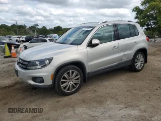 2013 Volkswagen Tiguan SE z VIN WVGBV7AX0DW539618, wystawiony jako Copart lot #71529804 z przebiegiem 148 362 mil mil oraz Szkoda całkowita • Salvage title. Historia ofert i sprzedaży dostępna na DreamBid. Obrazek 1.