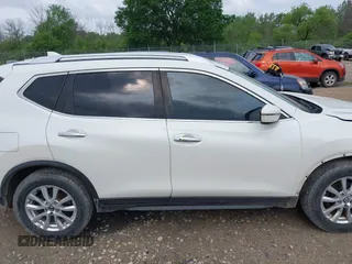 2017 Nissan Rogue SL with VIN JN8AT2MT9HW384613, listed as a IAAI auction lot 42452968 with 231,304 mi miles and . Bid and sale history available at DreamBid. Image 14.