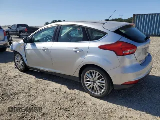 2017 Ford Focus Titanium with VIN 1FADP3N21HL279810, listed as a Copart auction lot 57950195 with 121,139 mi miles and Salvage title. Bid and sale history available at DreamBid. Image 2.