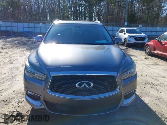 2016 Infiniti QX60 with VIN 5N1AL0MM0GC524715, listed as a IAAI auction lot 41215072 with 145,633 mi miles and . Bid and sale history available at DreamBid. Image 12.