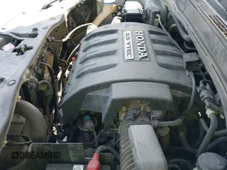 2006 Honda Pilot EX-L z VIN 5FNYF18526B011745, wystawiony jako IAAI lot #42933723 z przebiegiem 206 061 mil mil oraz . Historia ofert i sprzedaży dostępna na DreamBid. Obrazek 14.