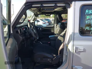 2023 Jeep Wrangler Willys with VIN 1C4HJXDG3PW577807, listed as a IAAI auction lot 42323674 with 28,808 mi miles and . Bid and sale history available at DreamBid. Image 5.
