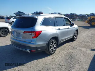 2019 Honda Pilot Elite with VIN 5FNYF6H00KB001016, listed as a IAAI auction lot 42583325 with 133,327 mi miles and . Bid and sale history available at DreamBid. Image 4.