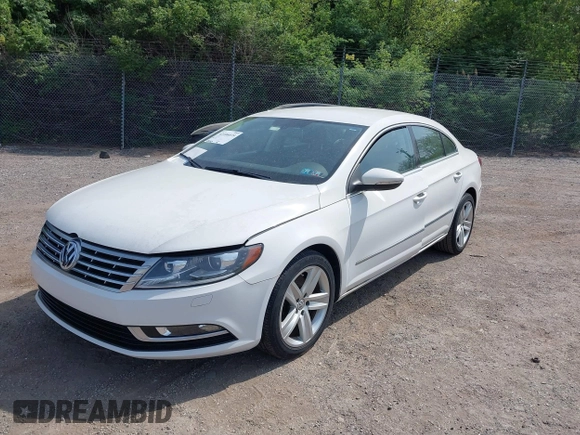 2013 Volkswagen CC Sport with VIN WVWBP7AN0DE523261, listed as a IAAI auction lot 42106039 with 136,105 mi miles. Bid and sale history available at carsss.com. Image 2.
