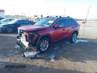2021 Toyota RAV4 XLE Premium with VIN 2T3C1RFV1MW145048, listed as a IAAI auction lot 41018272 with 61,959 mi miles and . Bid and sale history available at DreamBid. Image 19.