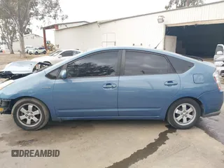 2007 Toyota Prius with VIN JTDKB20U477685445, listed as a IAAI auction lot 42020786 with 243,679 mi miles. Bid and sale history available at carsss.com. Image 14.