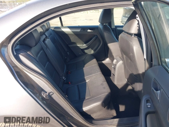 2013 Volkswagen Jetta TDI w/Premium z VIN 3VWLL7AJ6DM291317, wystawiony jako IAAI lot #42091621 z przebiegiem 169 448 mil mil oraz . Historia ofert i sprzedaży dostępna na DreamBid. Obrazek 8.