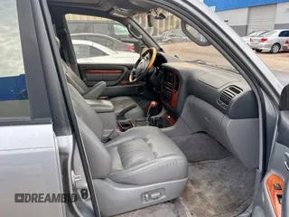 2001 Lexus LX 470 z VIN JTJHT00W313508801, wystawiony jako Copart lot #60938545 z przebiegiem 118 013 mil mil oraz Czysty tytuł • Clean title. Historia ofert i sprzedaży dostępna na DreamBid. Obrazek 5.