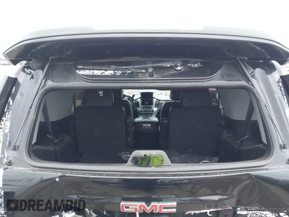 2015 GMC Yukon SLT with VIN 1GKS1BKC3FR129173, listed as a IAAI auction lot 41795585 with 97,893 mi miles. Bid and sale history available at carsss.com. Image 21.
