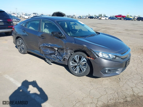 2018 Honda Civic Sedan EX-T with VIN JHMFC1F39JX037550, listed as a IAAI auction lot 41873229 with 50,853 mi miles. Bid and sale history available at carsss.com. Image 1.