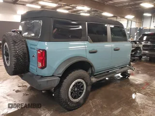 2023 Ford Bronco with VIN 1FMDE5DH0PLC12031, listed as a IAAI auction lot 41737952 with 8,781 mi miles. Bid and sale history available at carsss.com. Image 4.