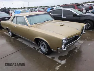 1967 Pontiac GTO z VIN 242077Z108825, wystawiony jako Copart lot #74747314 z przebiegiem 84 793 mil mil oraz Szkoda całkowita • Salvage title. Historia ofert i sprzedaży dostępna na DreamBid. Obrazek 4.