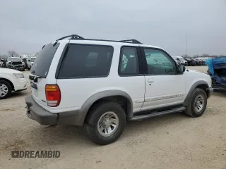 1999 Ford Explorer with VIN 1FMYU22E1XUA94061, listed as a Copart auction lot 44463165 with 172,246 mi miles and Salvage title. Bid and sale history available at DreamBid. Image 3.