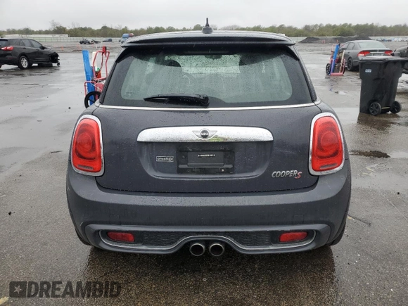2014 MINI Hardtop S with VIN WMWXM7C54ET985344, listed as a Copart auction lot 52012465 with 87,017 mi miles and Salvage title. Bid and sale history available at DreamBid. Image 6.