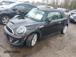 2013 MINI Convertible S with VIN WMWZP3C54DT297304, listed as a IAAI auction lot 41377572 with 101,991 mi miles and . Bid and sale history available at DreamBid. Image 17.