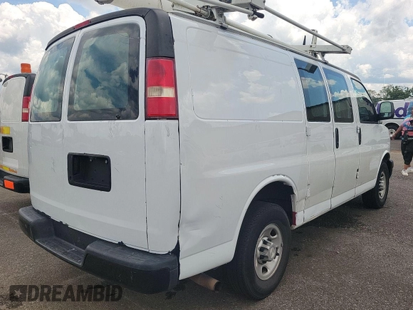 2015 Chevrolet Express Cargo with VIN 1GCWGFCF0F1248728, listed as a IAAI auction lot 42561489 with 263,640 mi miles and . Bid and sale history available at DreamBid. Image 4.