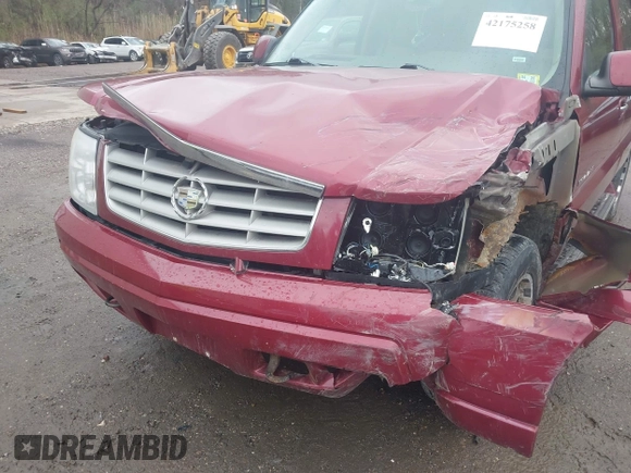 2004 Cadillac Escalade z VIN 1GYEK63N24R186095, wystawiony jako IAAI lot #42175258 z przebiegiem 172 342 mil mil oraz . Historia ofert i sprzedaży dostępna na DreamBid. Obrazek 16.