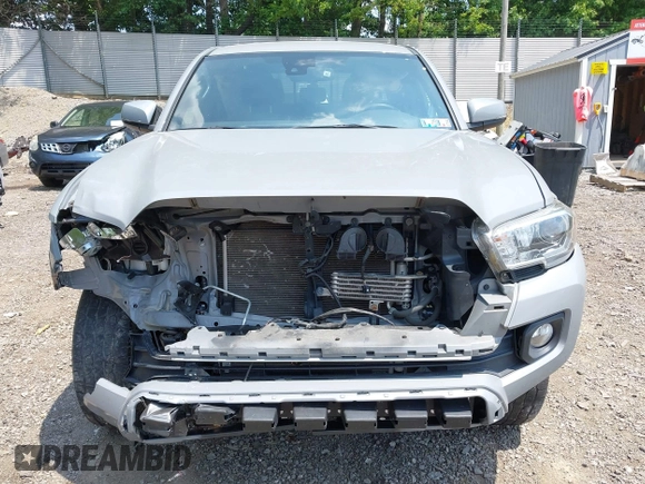 2020 Toyota Tacoma SR5 with VIN 3TMCZ5AN7LM341505, listed as a IAAI auction lot 42430647 with 73,285 mi miles and . Bid and sale history available at DreamBid. Image 13.