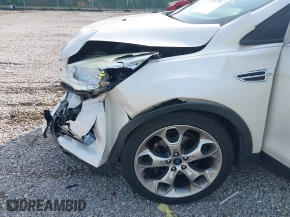 2015 Ford Escape Titanium with VIN 1FMCU0JXXFUA07175, listed as a IAAI auction lot 42447067 with 94,893 mi miles and . Bid and sale history available at DreamBid. Image 17.