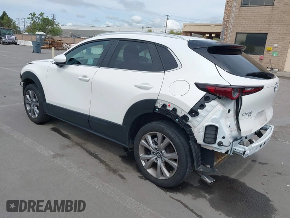 2023 Mazda CX-30 S Carbon Edition with VIN 3MVDMBCM0PM569100, listed as a IAAI auction lot 41978191 with 20,470 mi miles and . Bid and sale history available at DreamBid. Image 3.