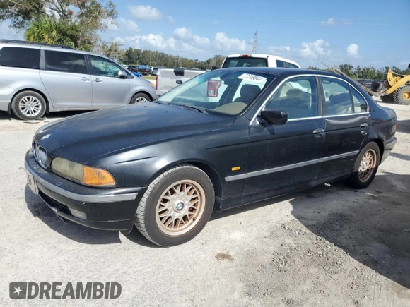 2000 BMW 5 Series 528iA with VIN WBADM6340YGU16735, listed as a Copart auction lot 77249644 with 0 mi miles and Salvage Title. Bid and sale history available at carsss.com. Image 1.