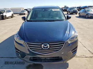 2016 Mazda CX-5 Grand Touring with VIN JM3KE2DY6G0668313, listed as a Copart auction lot 48353535 with 70,085 mi miles and Salvage Title. Bid and sale history available at carsss.com. Image 5.