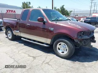 2000 Ford F-150 XL z VIN 1FTRX07WXYKA04070, wystawiony jako IAAI lot #42587148 z przebiegiem 254 717 mil mil oraz . Historia ofert i sprzedaży dostępna na DreamBid. Obrazek 1.
