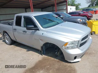 2014 Ram 1500 Tradesman z VIN 1C6RR7FT2ES106542, wystawiony jako IAAI lot #42461071 z przebiegiem 117 402 mil mil oraz . Historia ofert i sprzedaży dostępna na DreamBid. Obrazek 1.