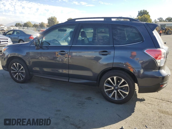 2018 Subaru Forester Premium with VIN JF2SJGEC1JH444025, listed as a Copart auction lot 77987034 with 56,336 mi miles and Salvage Title. Bid and sale history available at carsss.com. Image 2.