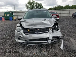 2013 Ford Escape Titanium with VIN 1FMCU9J94DUB00695, listed as a Copart auction lot 56633955 with 129,011 mi miles and Salvage title. Bid and sale history available at DreamBid. Image 5.